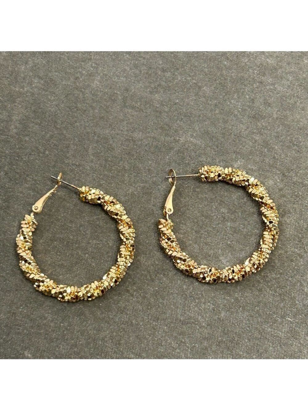gold-toned twisted hoop earrings